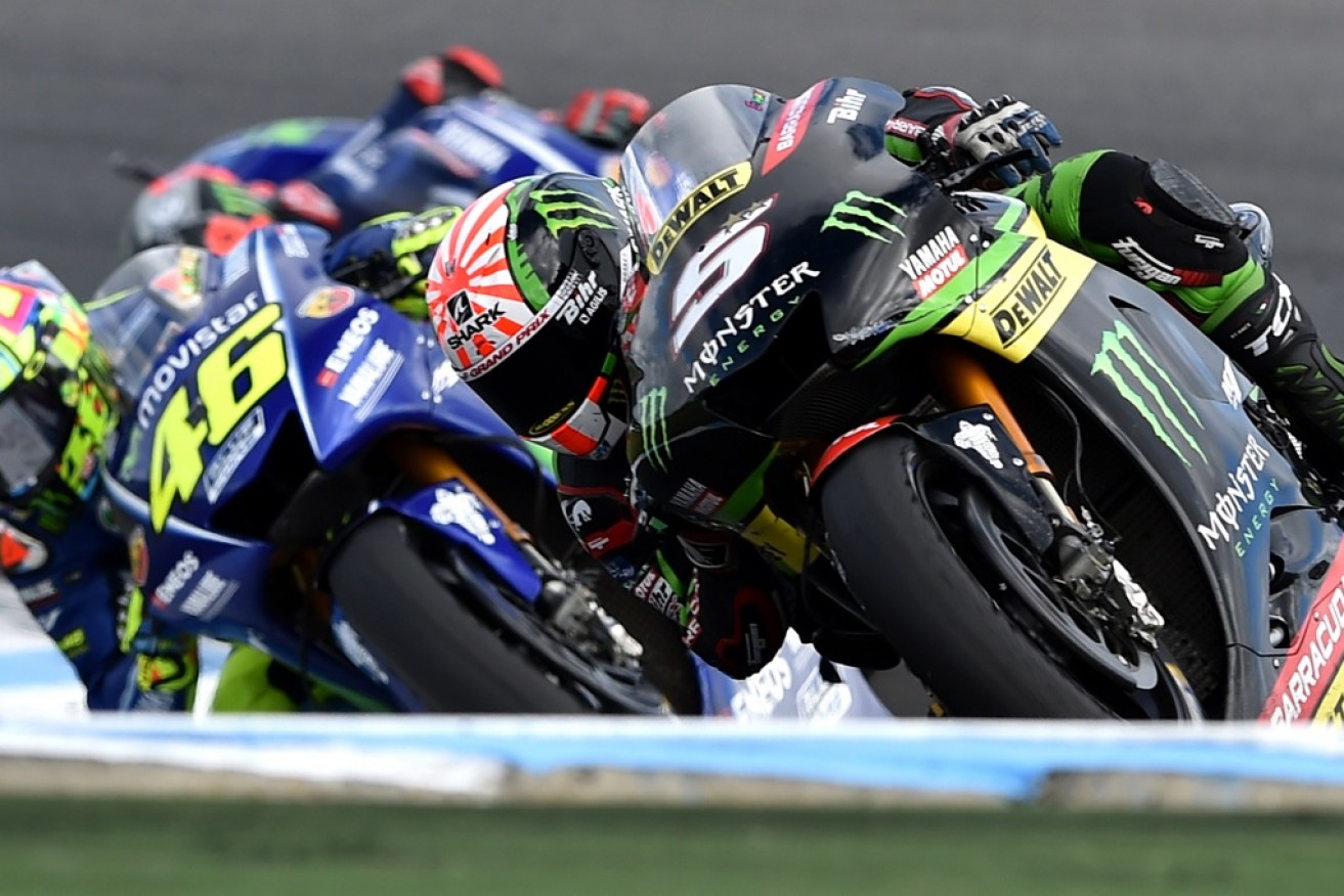 Yamaha Tech 3 rider Johann Zarco of France (front) powers ahead of Yamaha rider Valentino Rossi of Italy during the Australian MotoGP Grand Prix at Phillip Island on October 22.