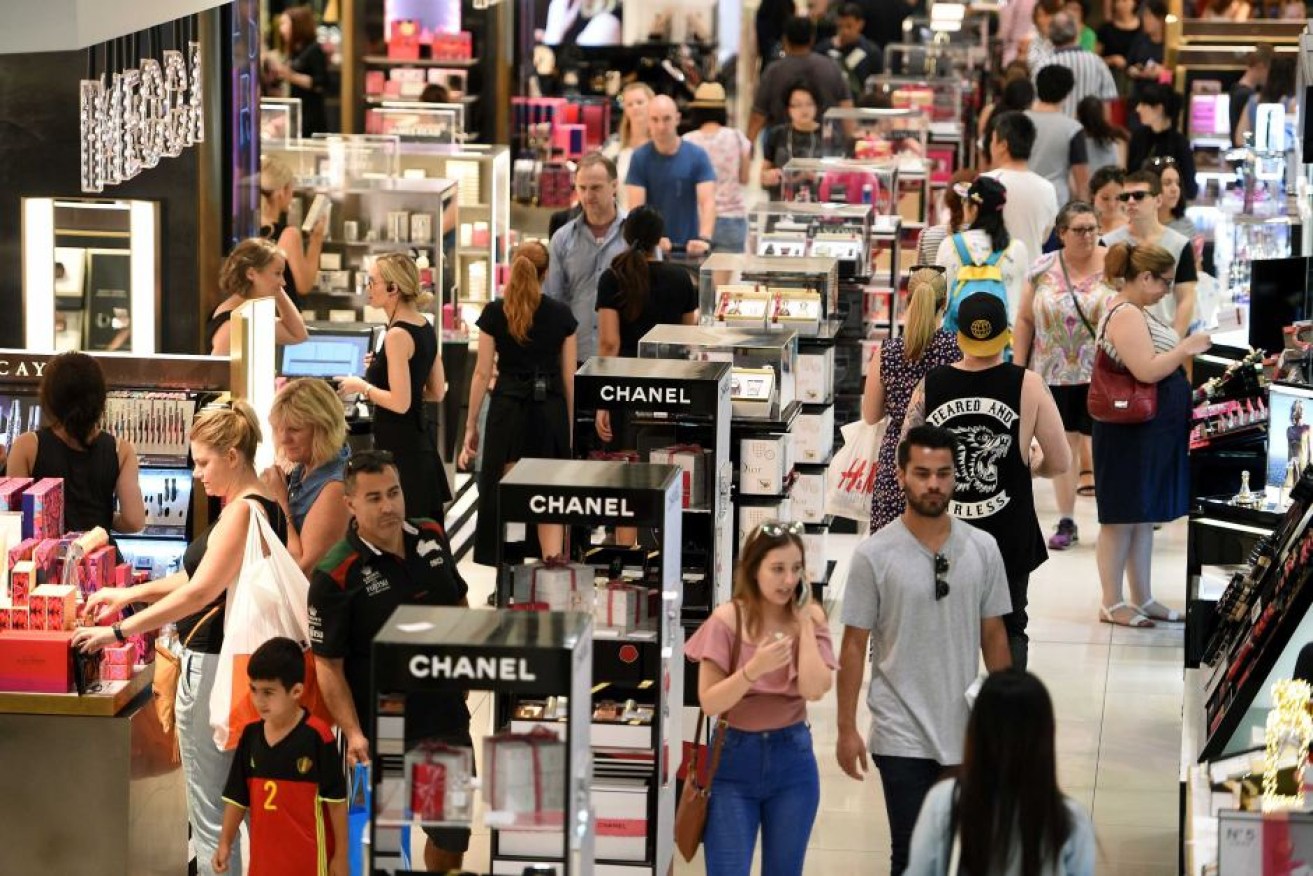 Late opening hours: Shoppers in a Sydney department store. 