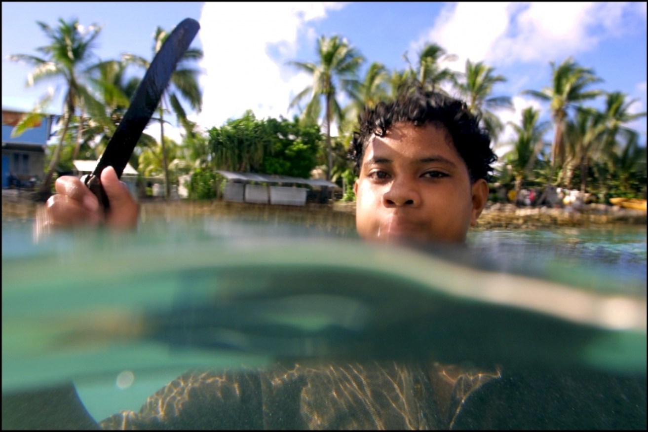 Residents of the tiny nine-island nation of Tuvalu fear their country will disappear as sea levels rise. 