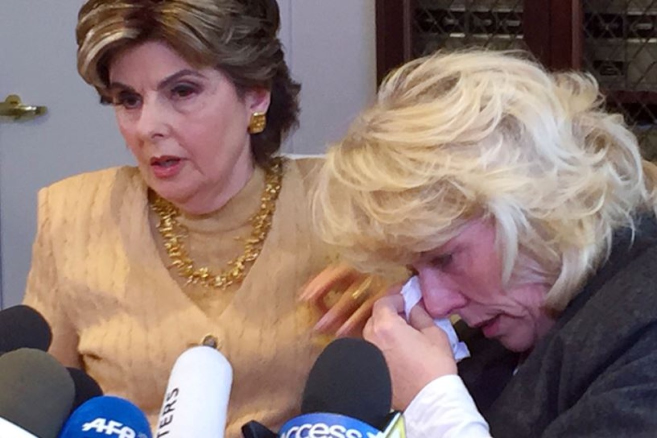 Former actress Heather Kerr (r), with attorney Gloria Allred, dissolves in tears as she recalls the day in 1989 when she alleges Harvey Weinstein sexually molested her.