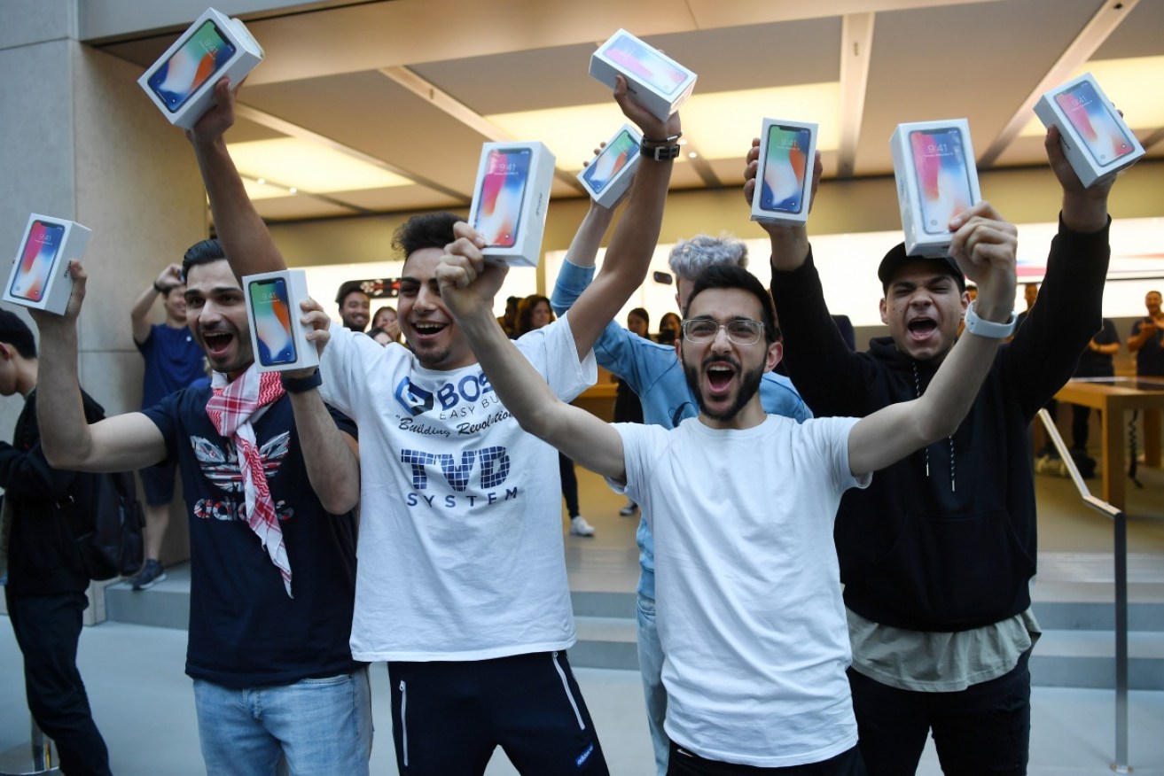 Customers queued up at dawn outside Sydney's Apple store to get their iPhone X.
