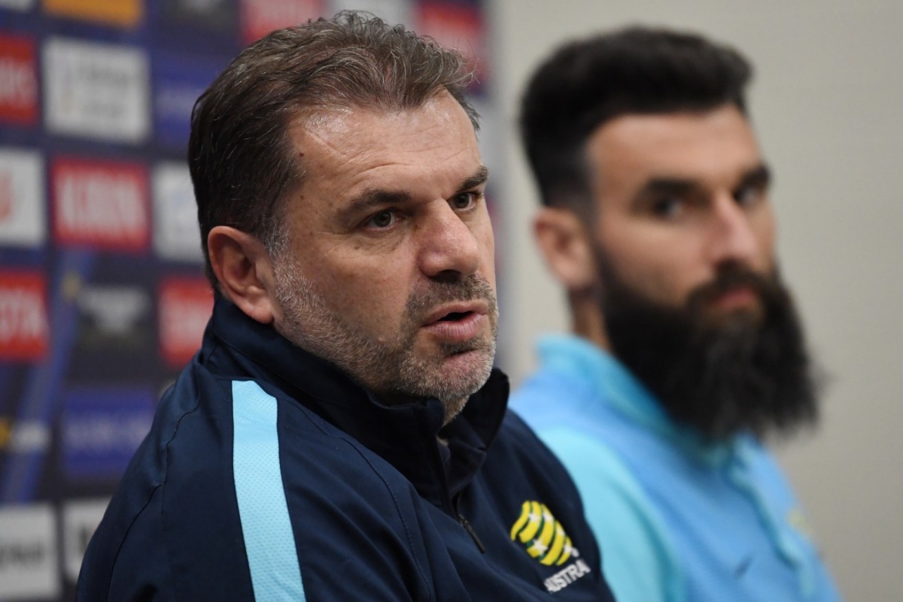 Ange Postecoglou says criticism makes him more determined to 'go down his own path'.