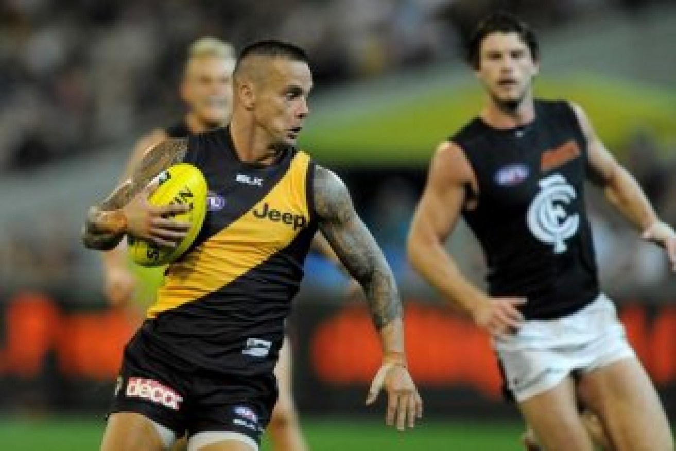 Ex-Richmond player King denies extortion charges.