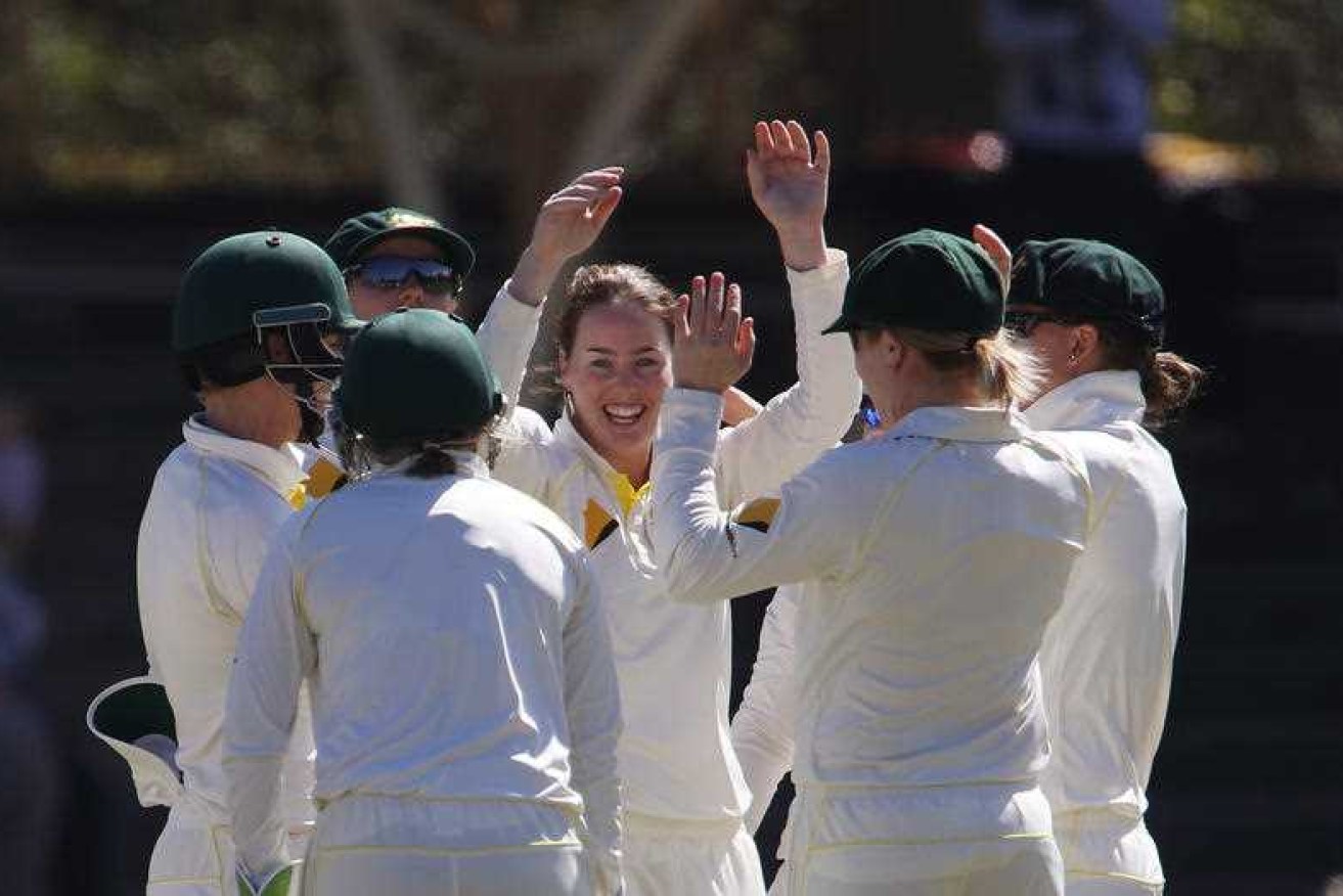 Amanda Wellington celebrates a wicket for Australia but England managed to salvage a draw.