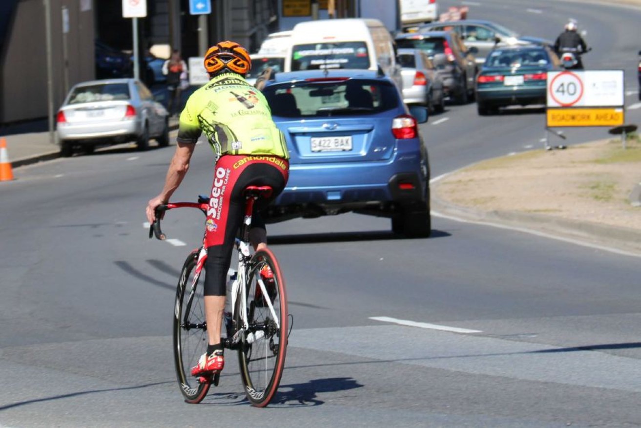 Mandatory helmet laws continue to divide cyclists, survey finds.