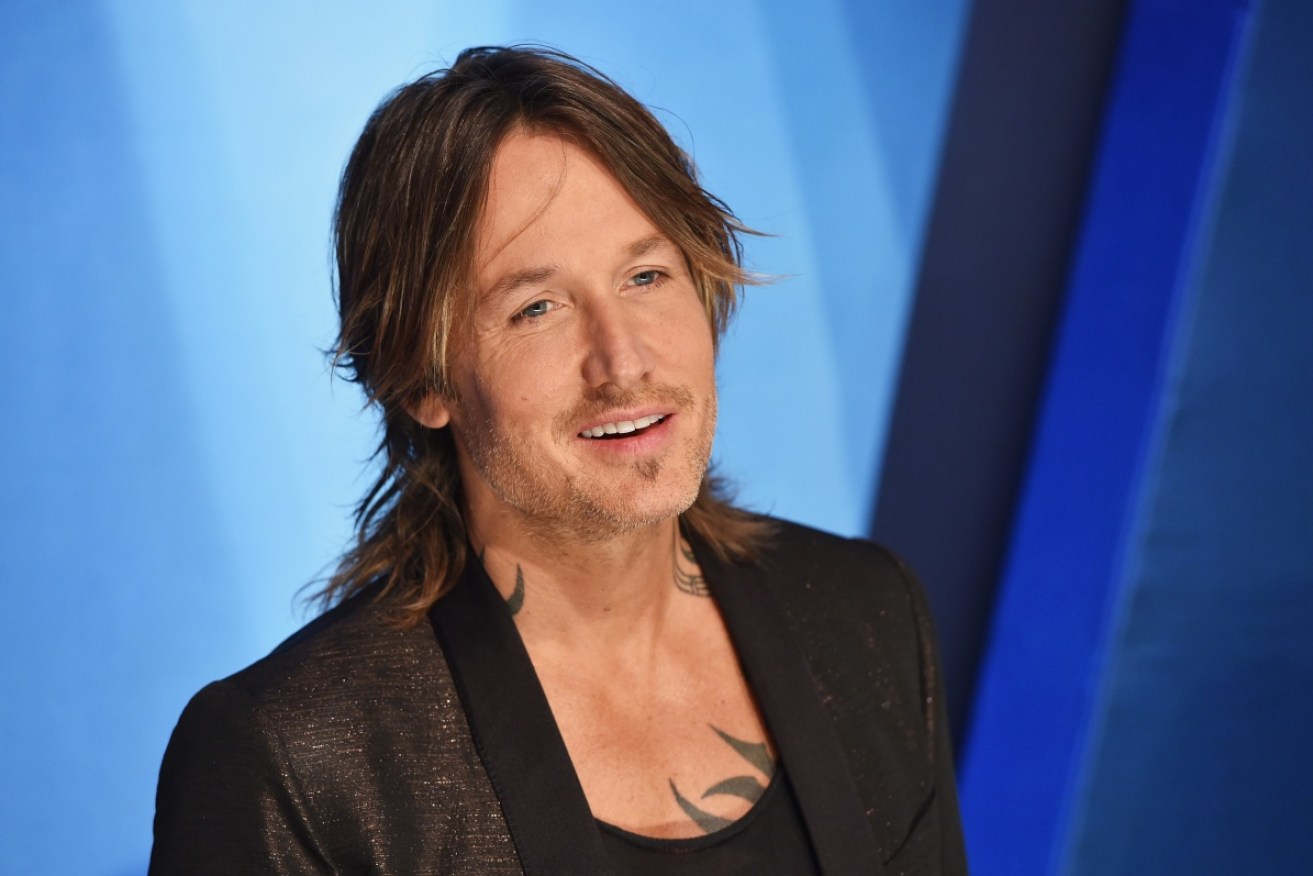Keith Urban was solo on the red carpet at the 51st Country Music Awards in Nashville.