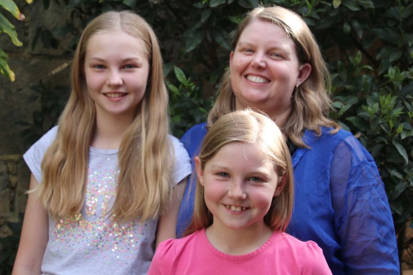 Perth mother Maggie Johns, with daughters Sarah, 11, and Becca, 8, says babysitting apps made life easier.