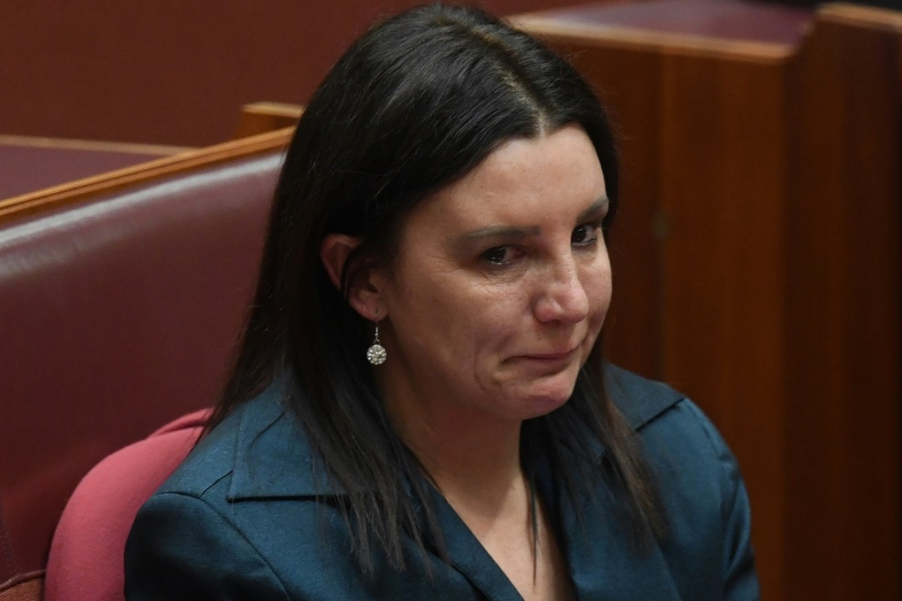 Engulfed by the parliamentary eligibiity crisis, a tearful Lambie resigned from the Senate on 