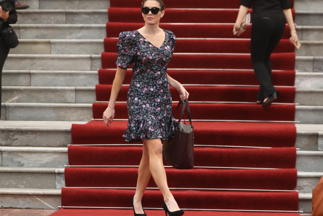 Hope Hicks arrives at Hanoi's Presidential Palace in Vietnam while accompanying Donald Trump on his Asia tour.