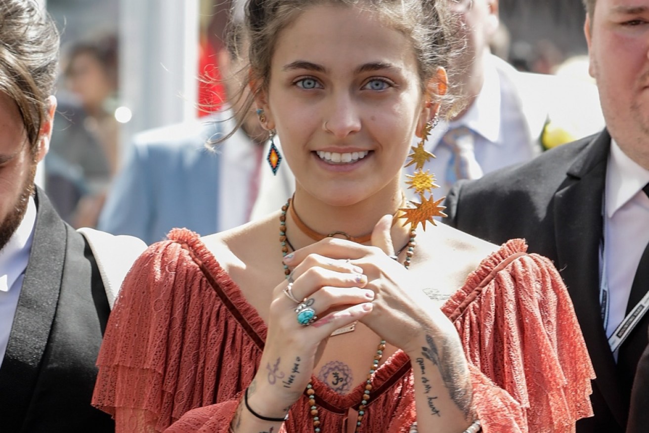 Paris Jackson wiped all of her makeup off and put her hair up to enjoy the Melbourne Cup. 