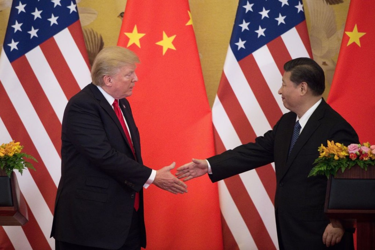 Donald Trump meets China's Xi Jinping last November.