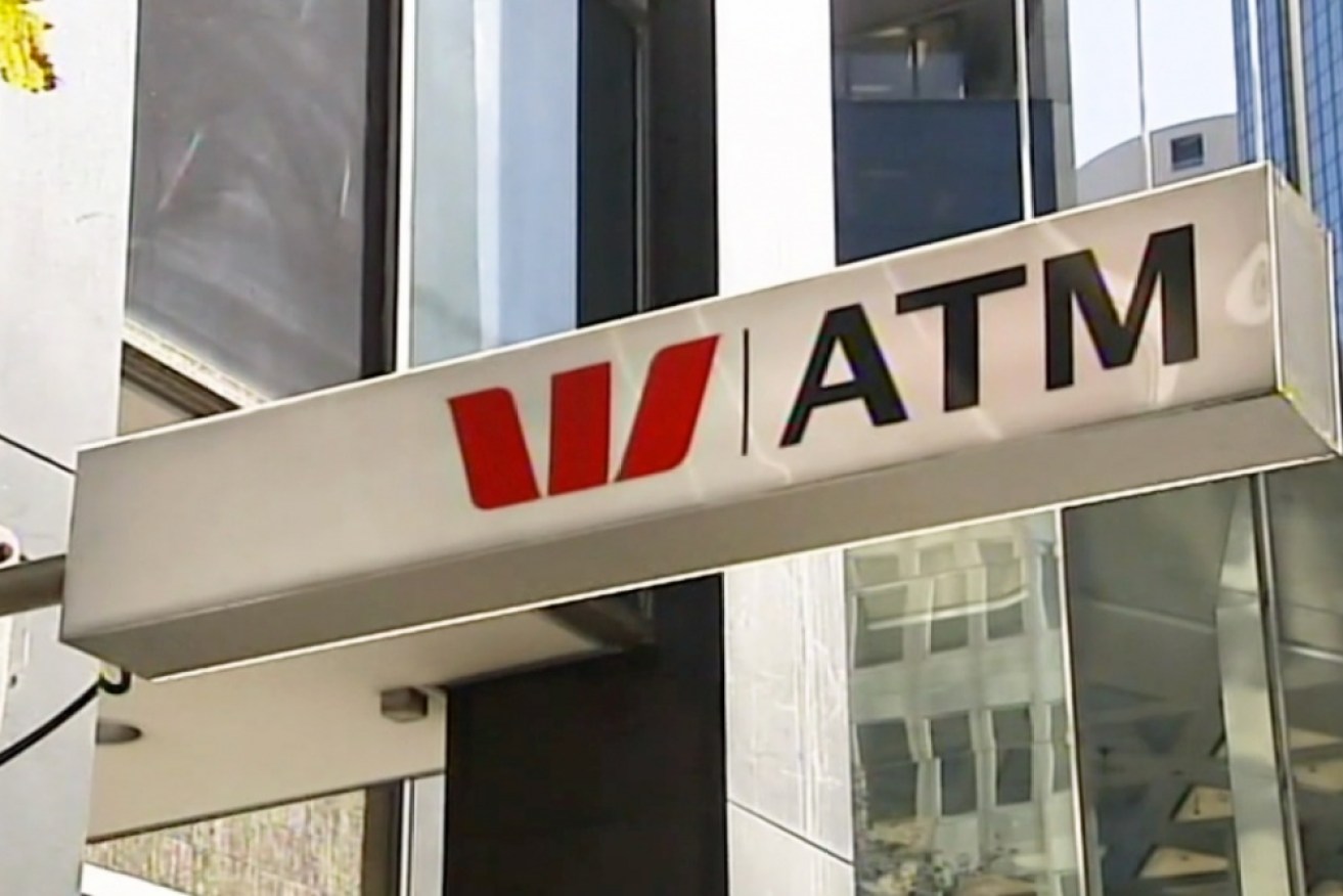 Westpac has cut its dividend for the first time in a decade after the bank's full-year cash profit fell 15 per cent to $6.85 billion.