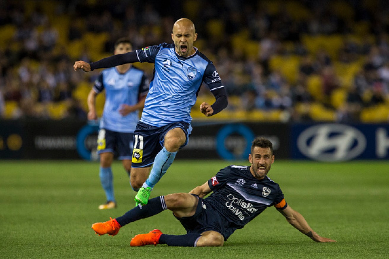 Looking to the future Adrian Mierzekewski of Sydney FC and Carl Valeri of Melbourne Victory in a recent match.   