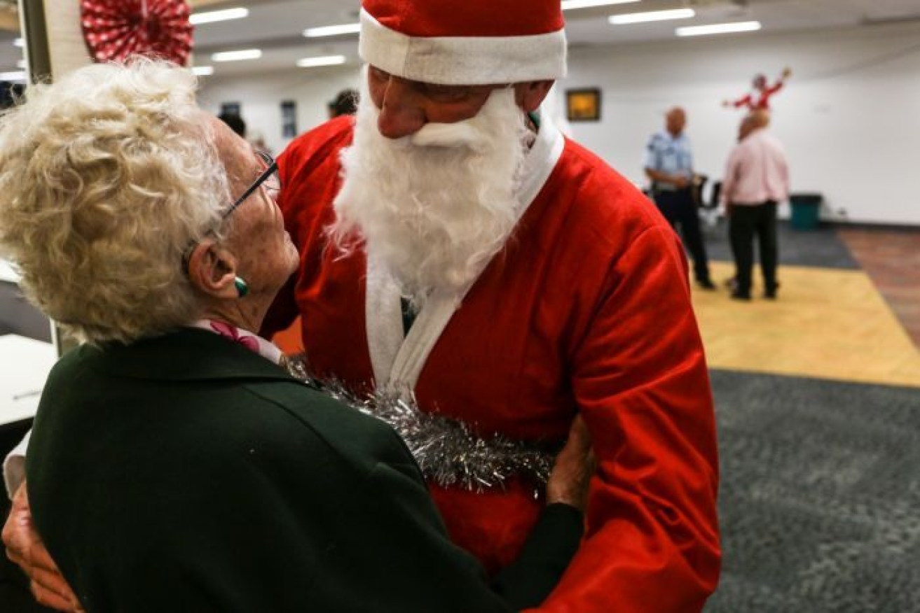 'Santa' David greets a pensioner at the prison. He's in the final year of his sentence.