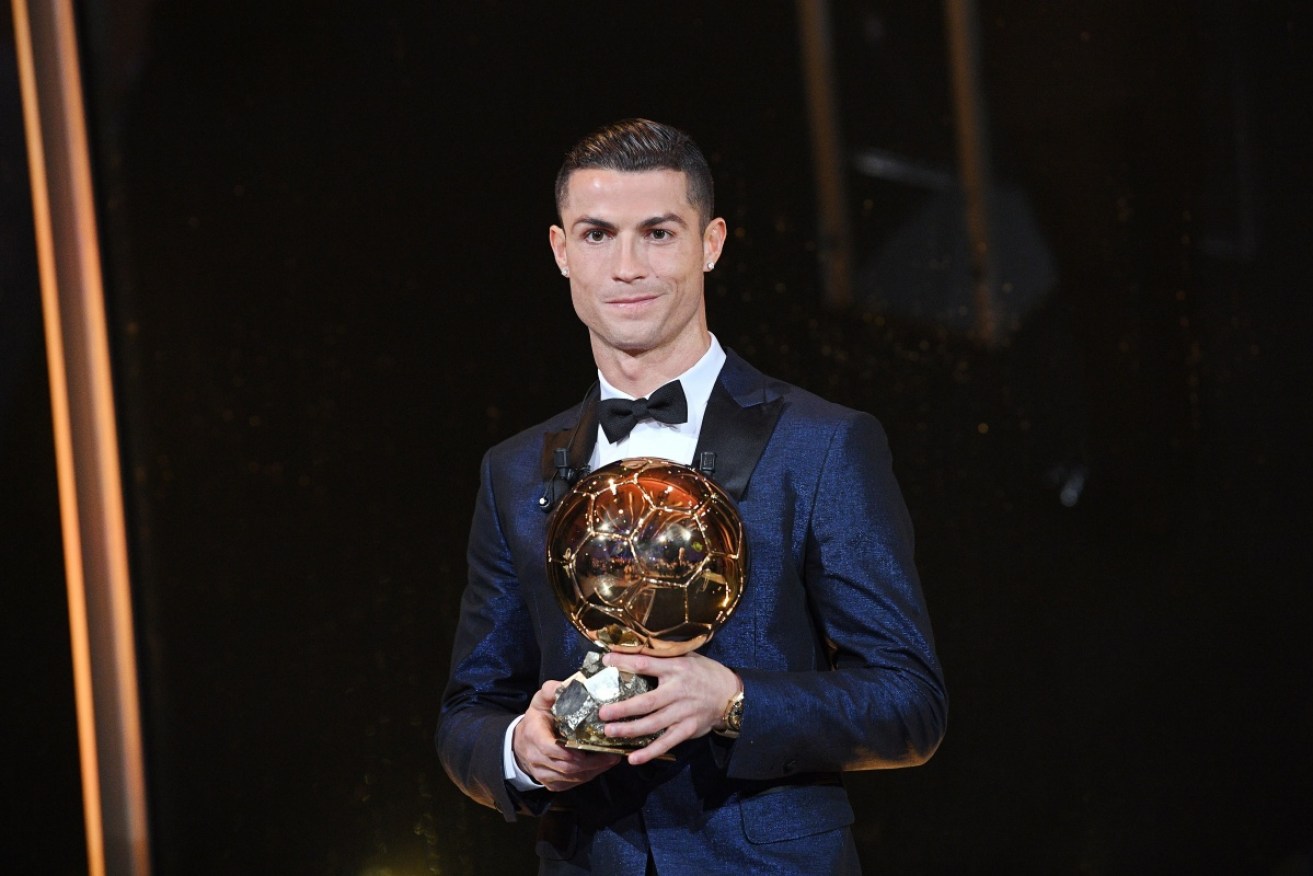 Real Madrid superstar Cristiano Ronaldo has been named world player of the year for a record-equalling fifth time.