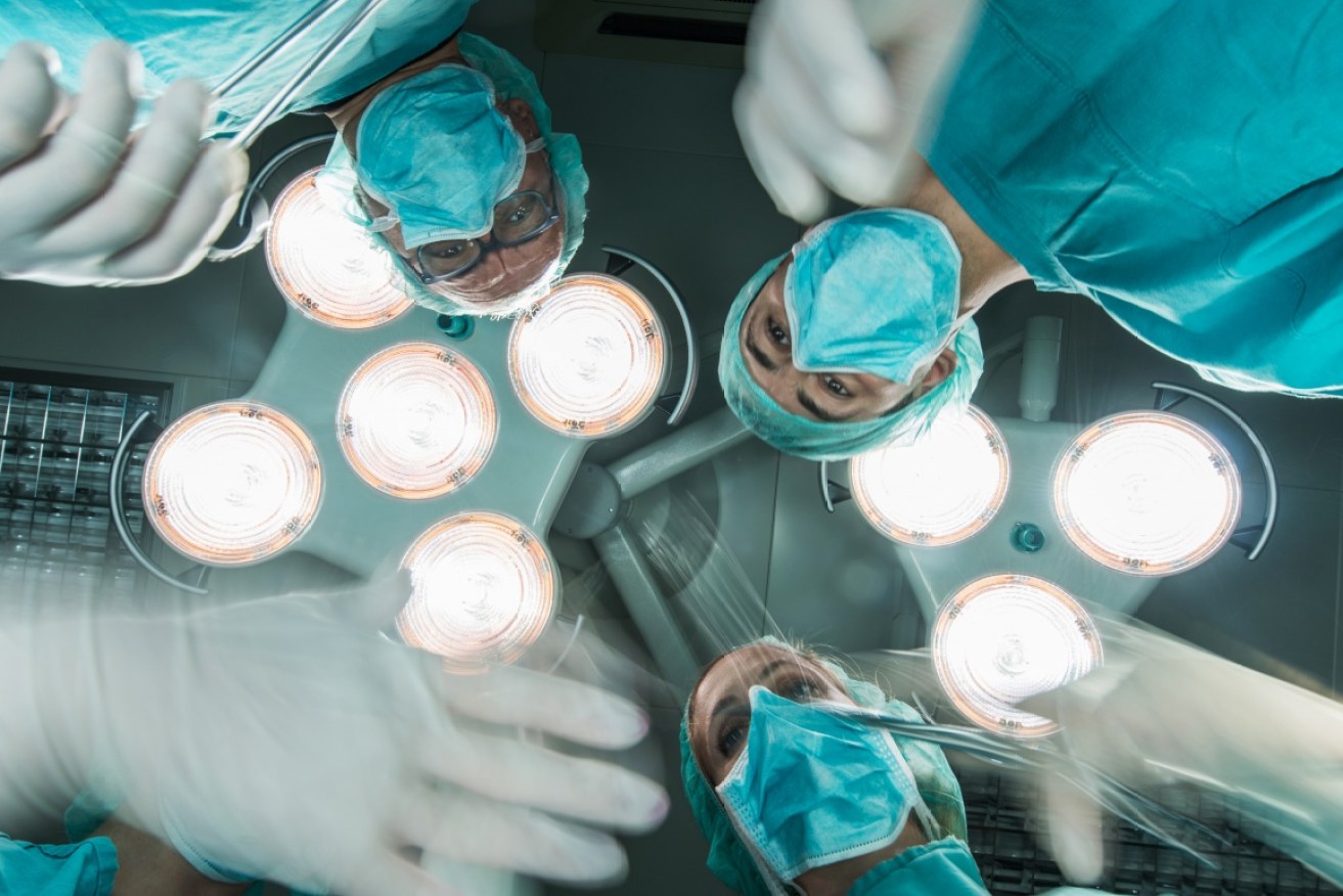 A court heard the surgeon used a laser to sign patients' organs.