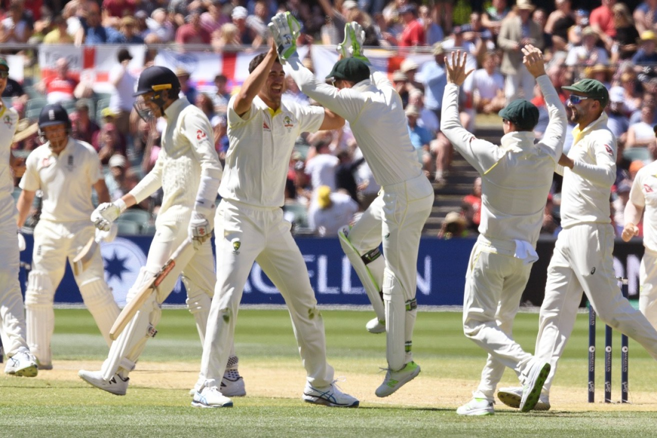 Australia celebrate a wicket.