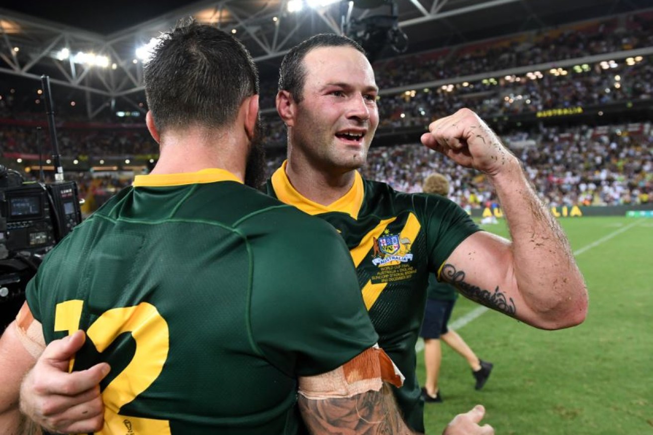 Boyd Cordner  celebrates Australia's winning the Rugby League World Cup final in Brisbane.