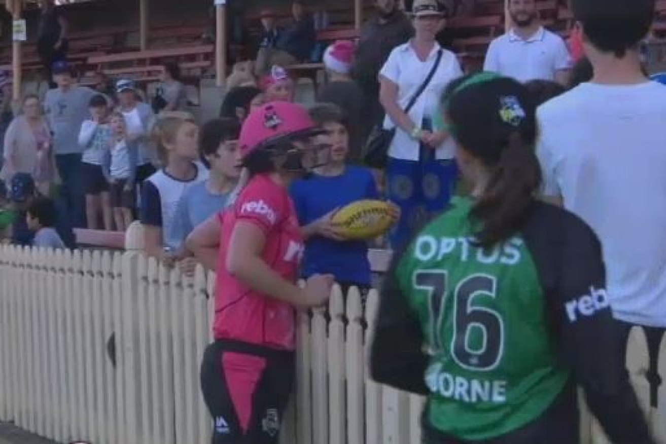 Big-hitting Ellyse Perry raced to the fence to check on the boy knocked silly by her scorching six.