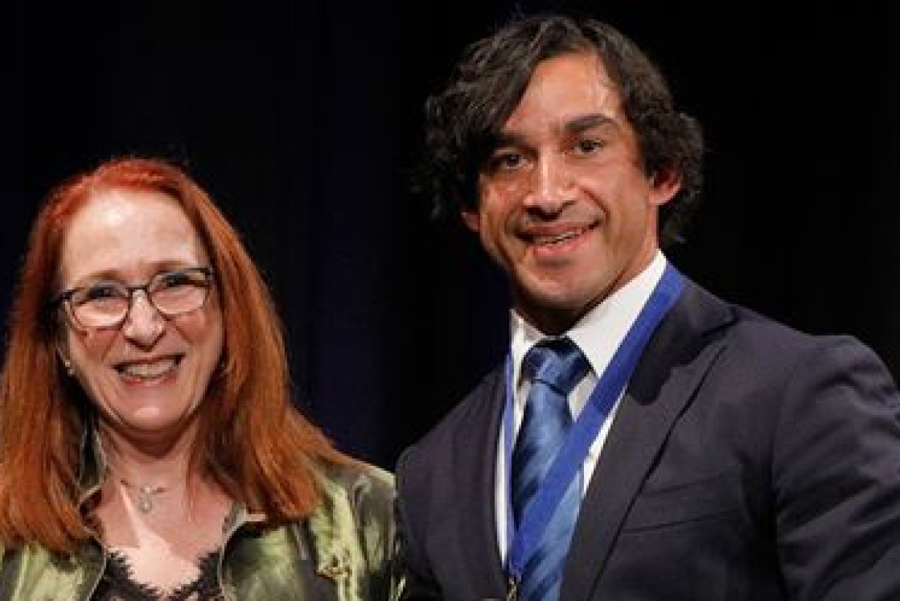 Human Rights Johnathan Thurston shares a smile after drying his tears with Australian Human Rights Commission President Rosalind Croucher.