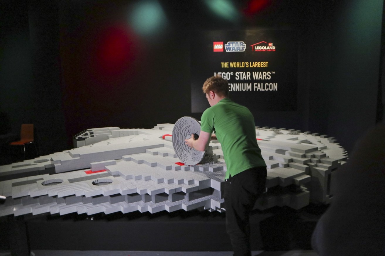 Finishing touches are put on the world's largest Lego Millennium Falcon.