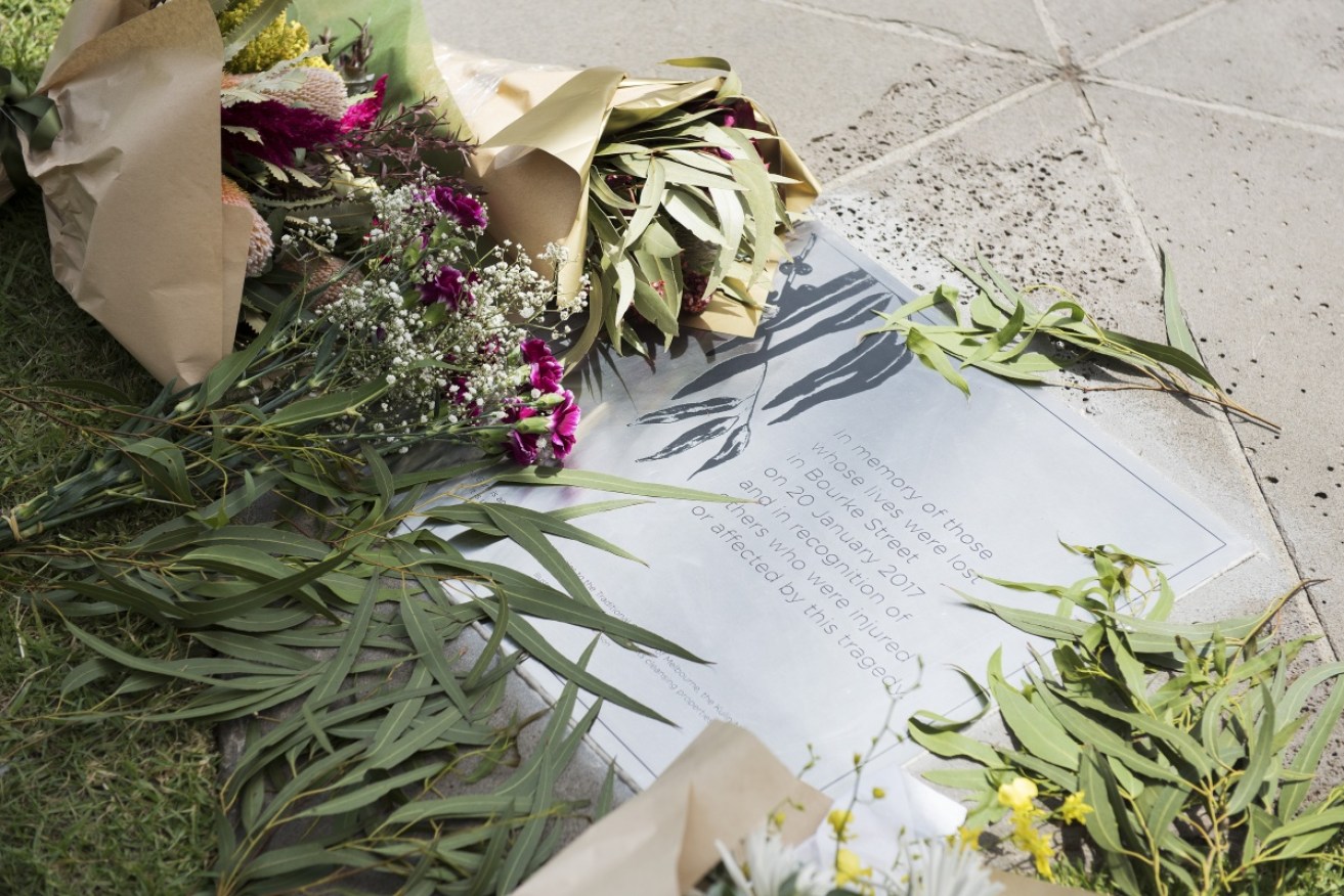 Floral tributes at the memorial unveiled in Parliament gardens on the weekend. 