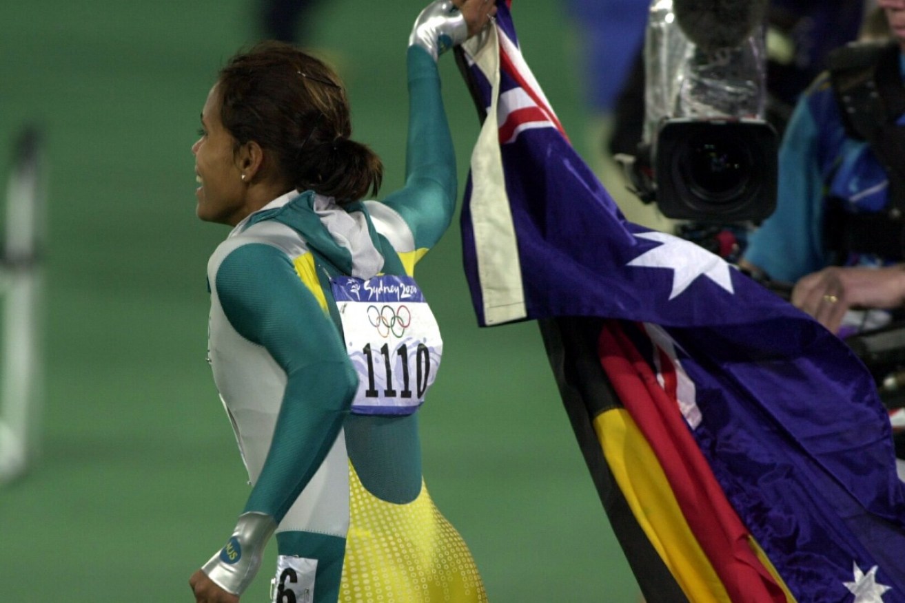Cathy Freeman's victory lap at the Sydney Olympics was a key moment in reconciliation, writes Wendy Harmer.