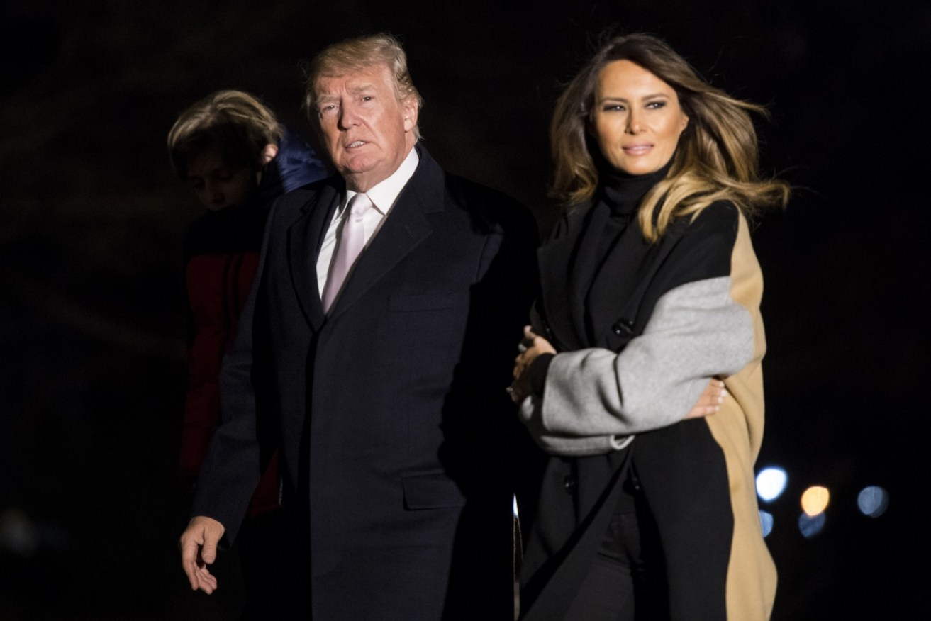 Body language, anyone? Donald and Melania Trump return to the White House on January 15.