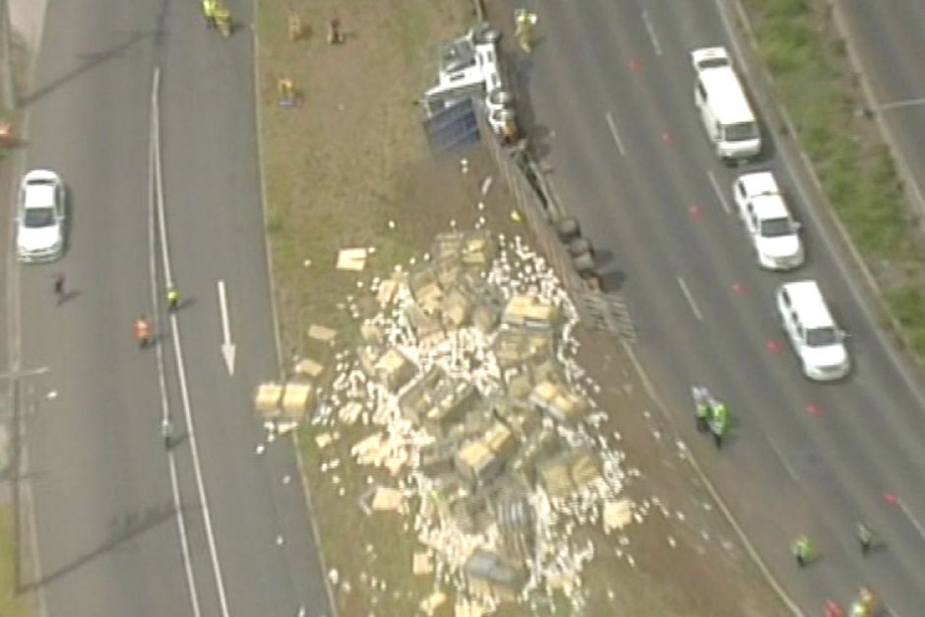 Crates of chickens littered the side of the road after the crash.