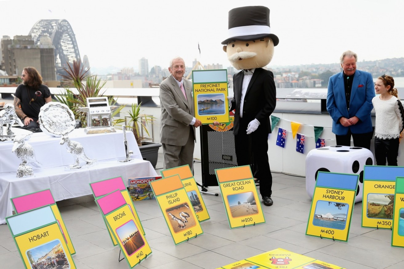 The launch of Australian Monopoly on Sydney Harbour. Tasmania says homeowners in Sydney could trade up in Hobart.