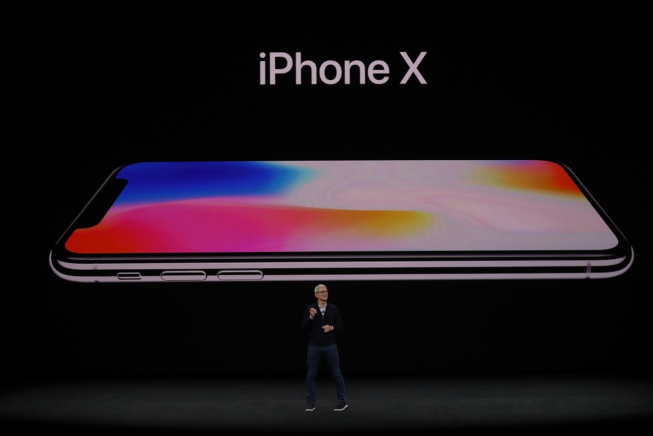 CEO Tim Cook unveiling the iPhone X 