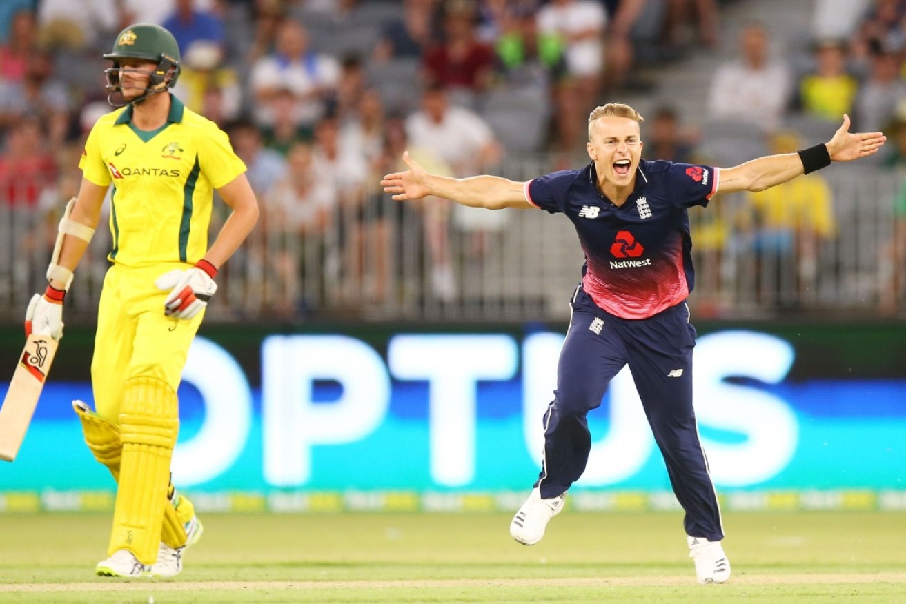 Tom Curran celebrates the moment England won the match in Perth. 