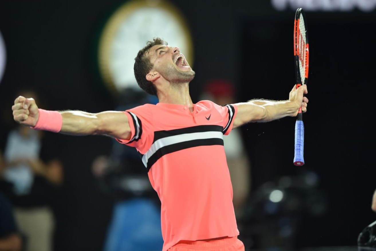 Grigor Dimitrov celebrates victory against Nick Kyrgios after an epic four-set clash.