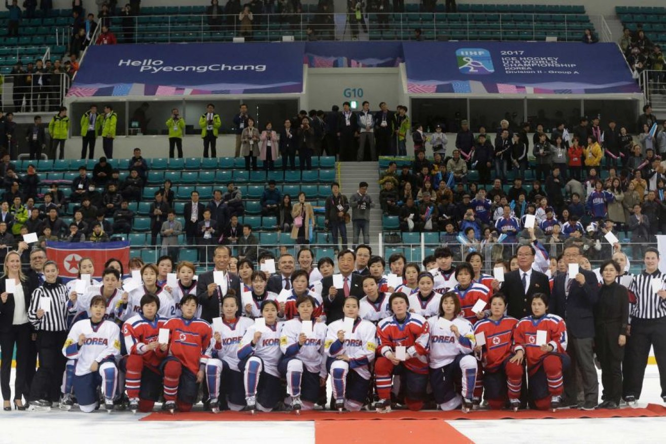 Women's ice hockey players of South Korea and North Korea after their world championship game in 2017.