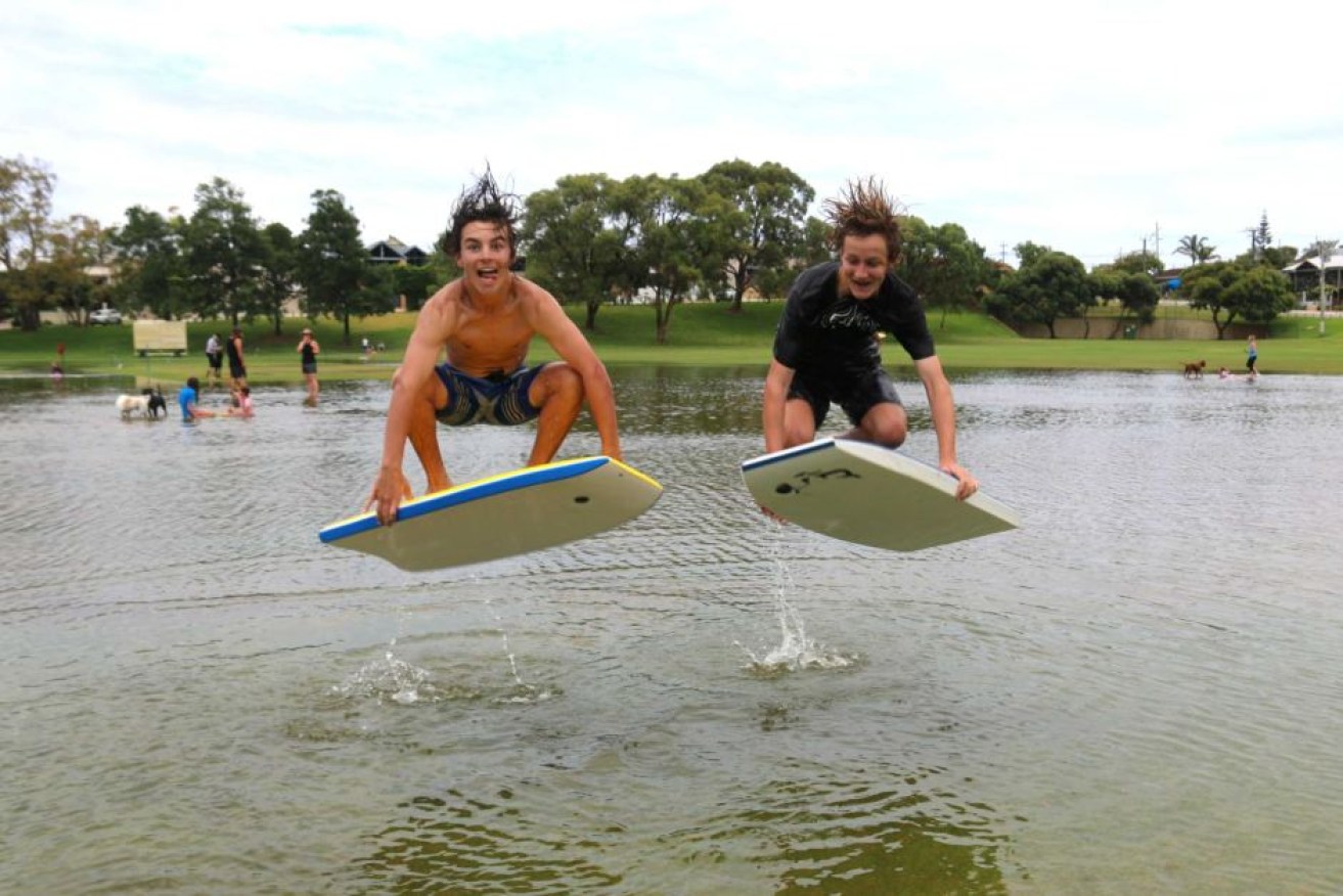 Sam Irwin and Jake Wheeler made the most of a flooded Abbett Park in Scarborough.
