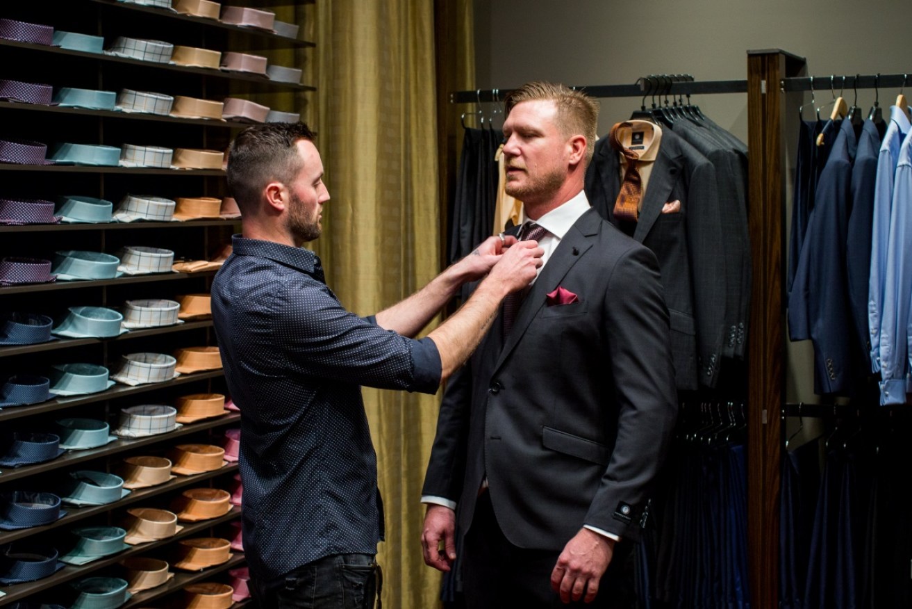 Dean (right) getting suited up for his <i>MAFS</i> wedding to Tracey, where he admitted he couldn't stop staring at her breasts.