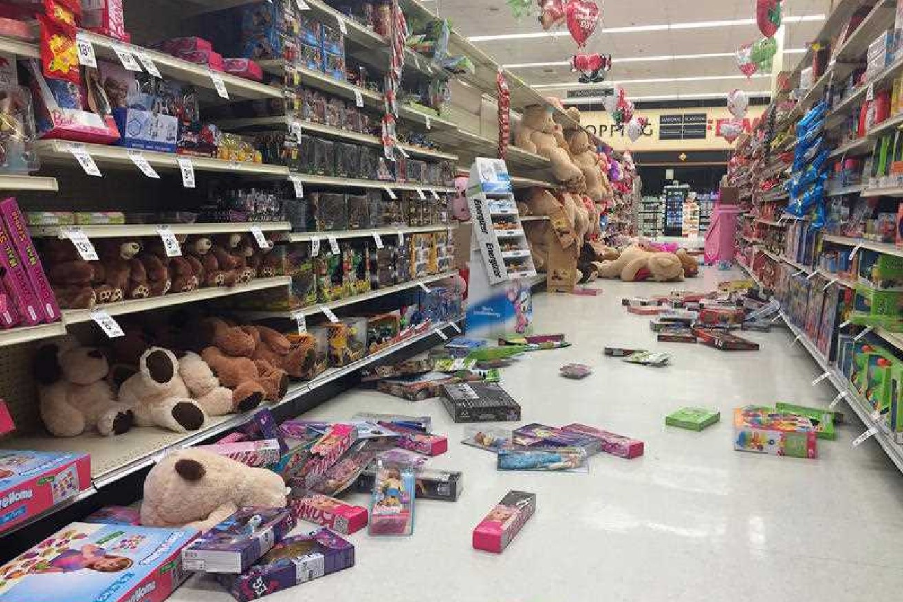 Items fallen from the shelves litter the aisles in a store in Alaska after a quake in 2016.