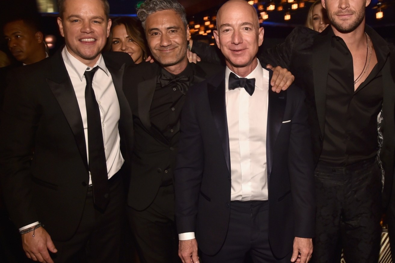 Jeff Bezos (second from right) with (from left) Matt Damon, Taika Waititi and Chris Hemsworth.