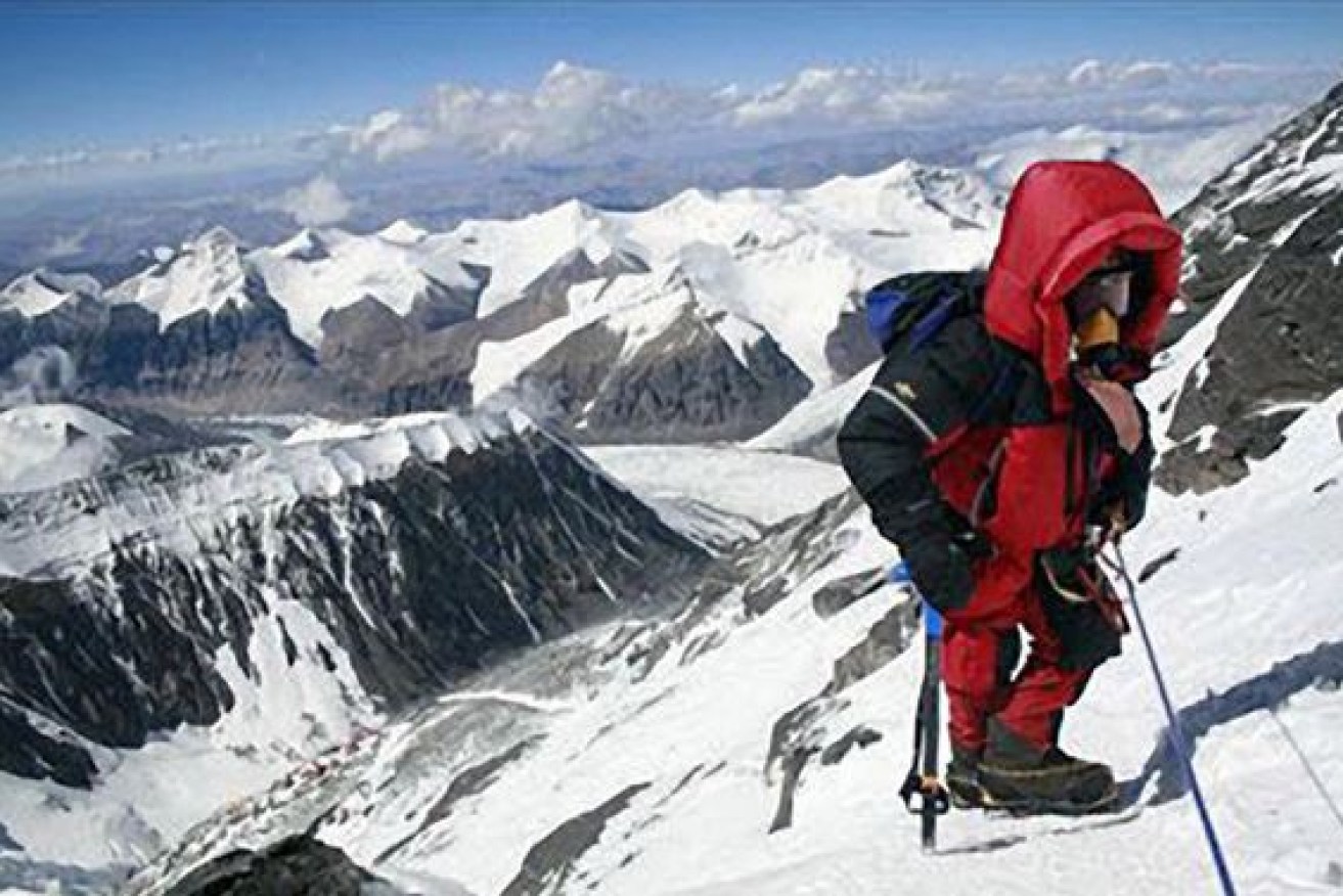 Katie Sarah hauls herself toward the summit of Everest -- just one of the 14 peaks she conquered.