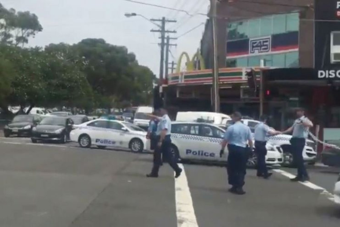 Police converge on Maroubra after the officer was stabbed and his assailant shot dead. 