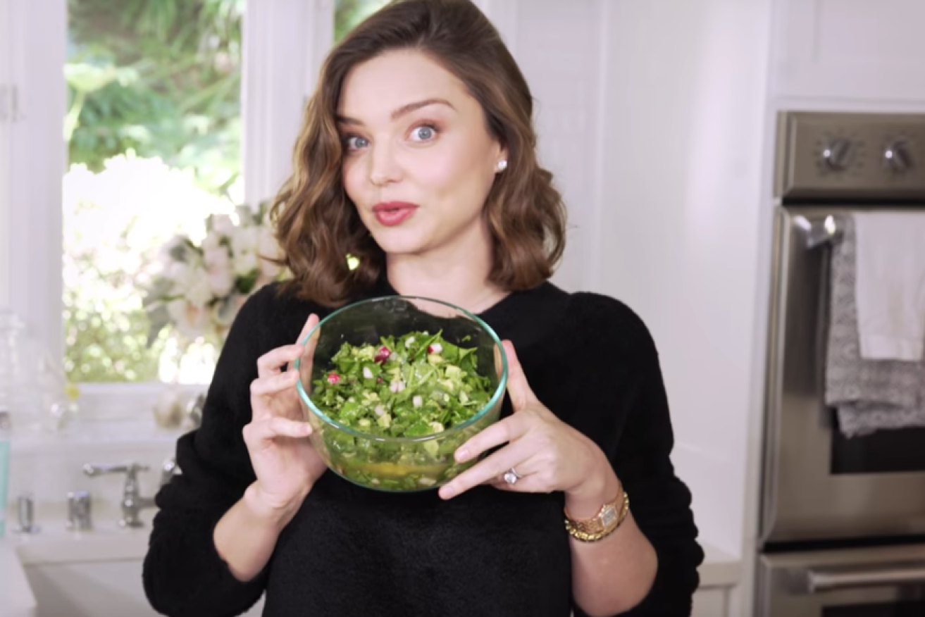 "I love food," shares Miranda Kerr, delighted at whipping up a green salad for lunch. 