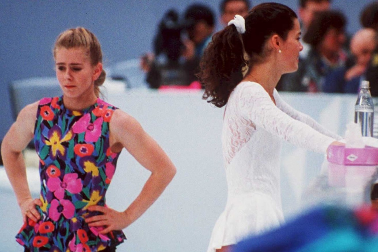 Tonya Harding (left) avoids rival Nancy Kerrigan (right) during a training session in 1994.