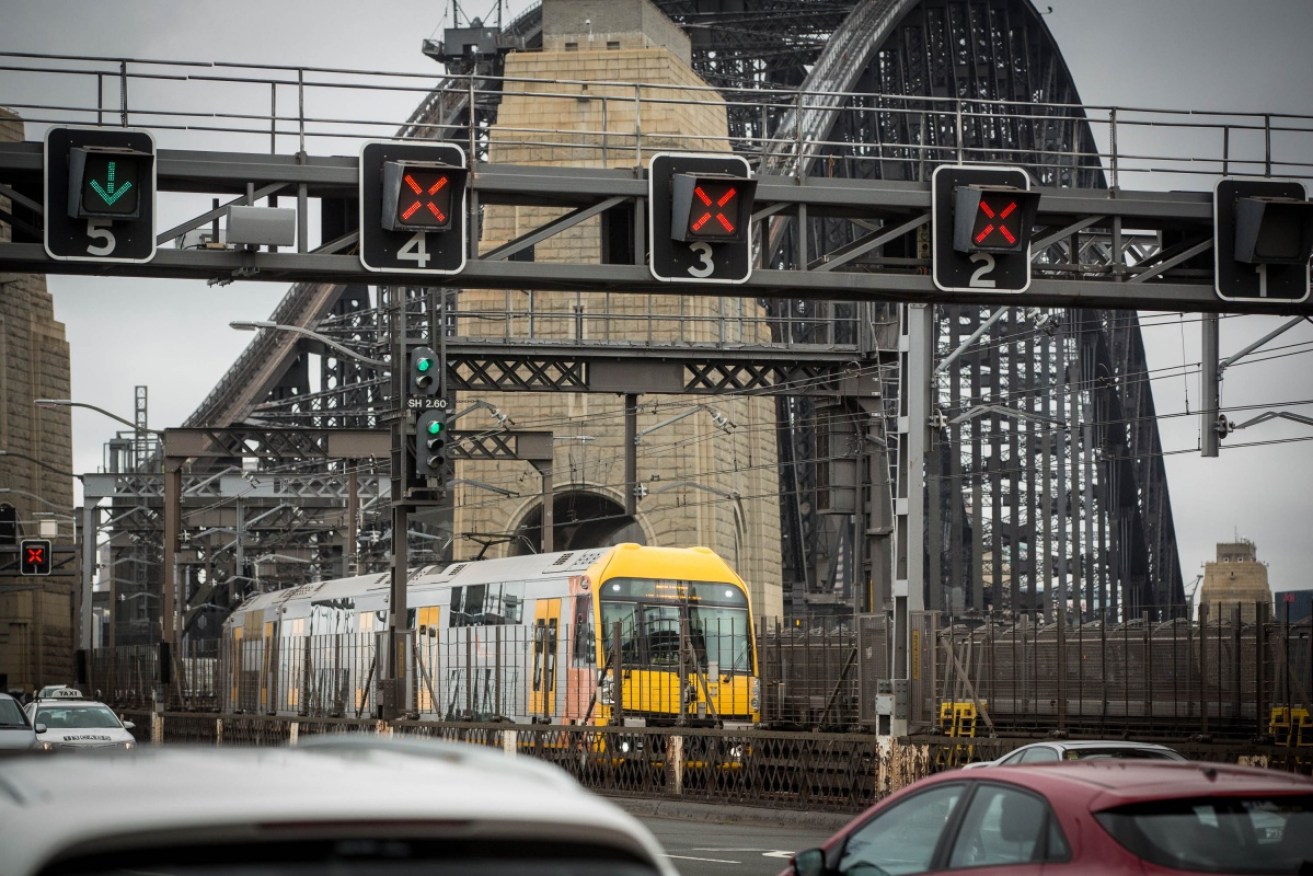 While the industrial wrangle over Korean-built trains continues, NSW Transport Minister David Elliott is enjoying a European getaway. <i>Photo: AAP</i>