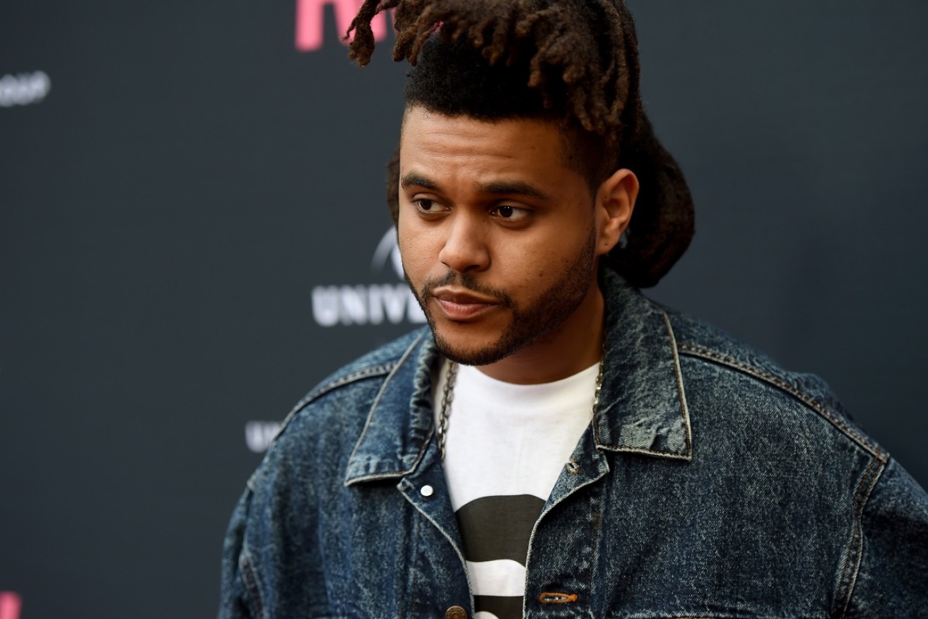 Musician The Weeknd has cut ties with retailer H&M over the "deeply offensive" ad.
