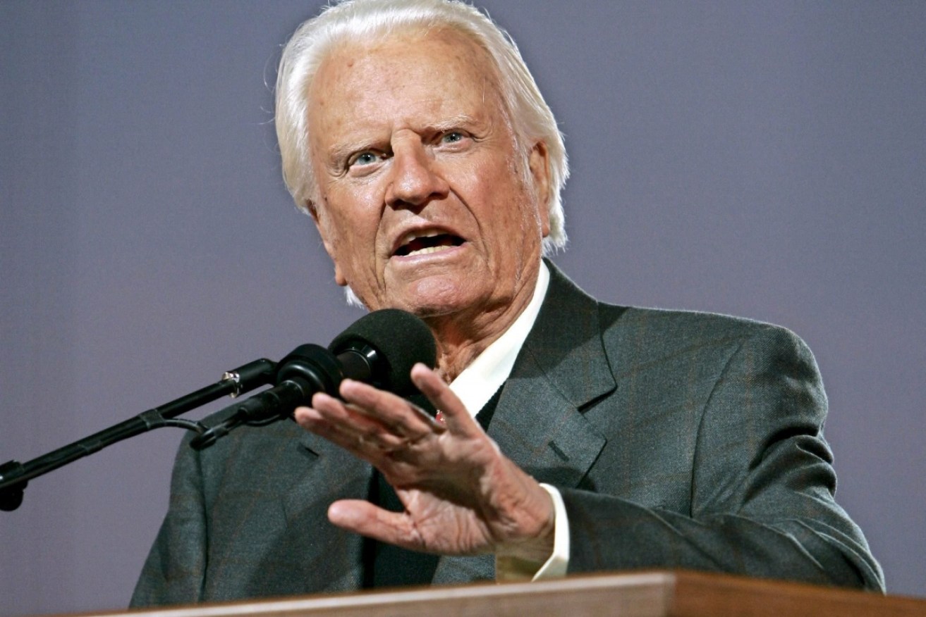 About 77 million saw Billy Graham preach in person while nearly 215 million more watched his crusades on television.