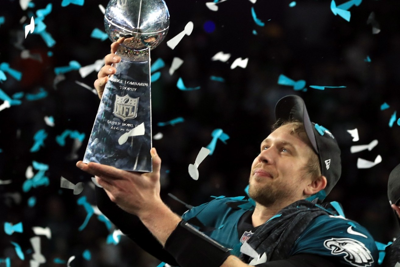 Foles celebrates with the Vince Lombardi Trophy.