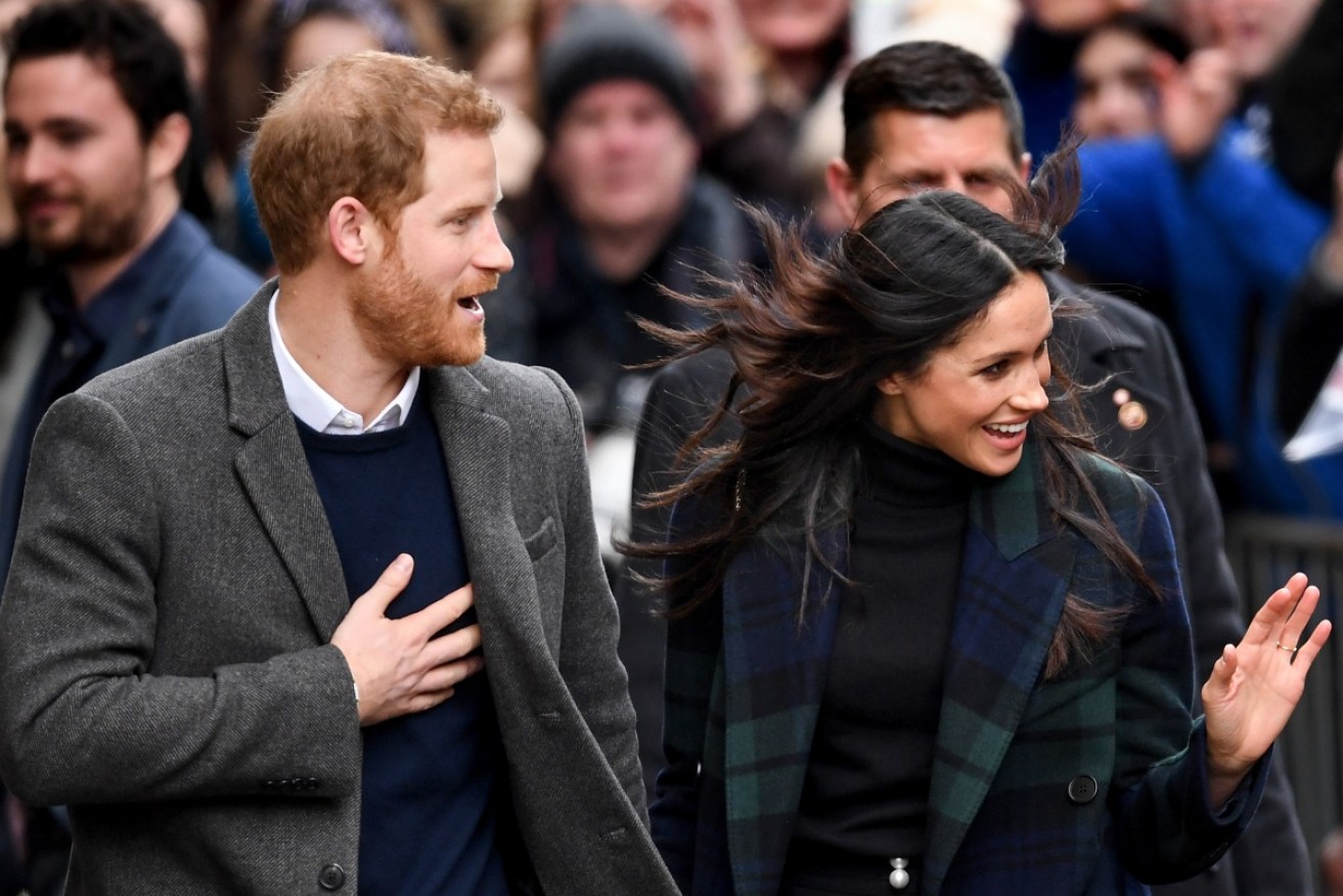 "It means a lot to both of us to be here," said Meghan Markle, in Edinburgh with Prince Harry on February 13.