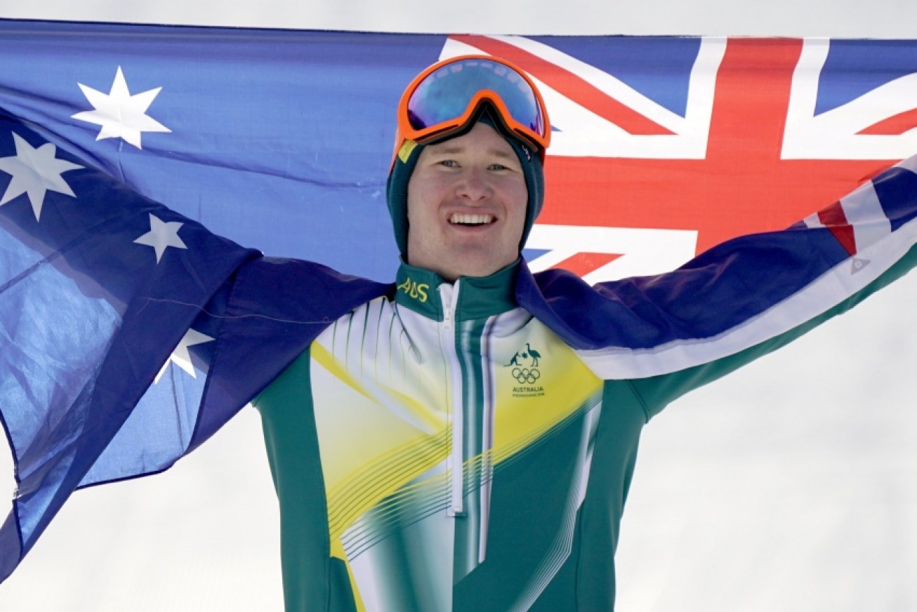 Snowboard cross silver medallist Jarryd Hughes will carry the flag for Australia at the closing ceremony in PyeongChang.