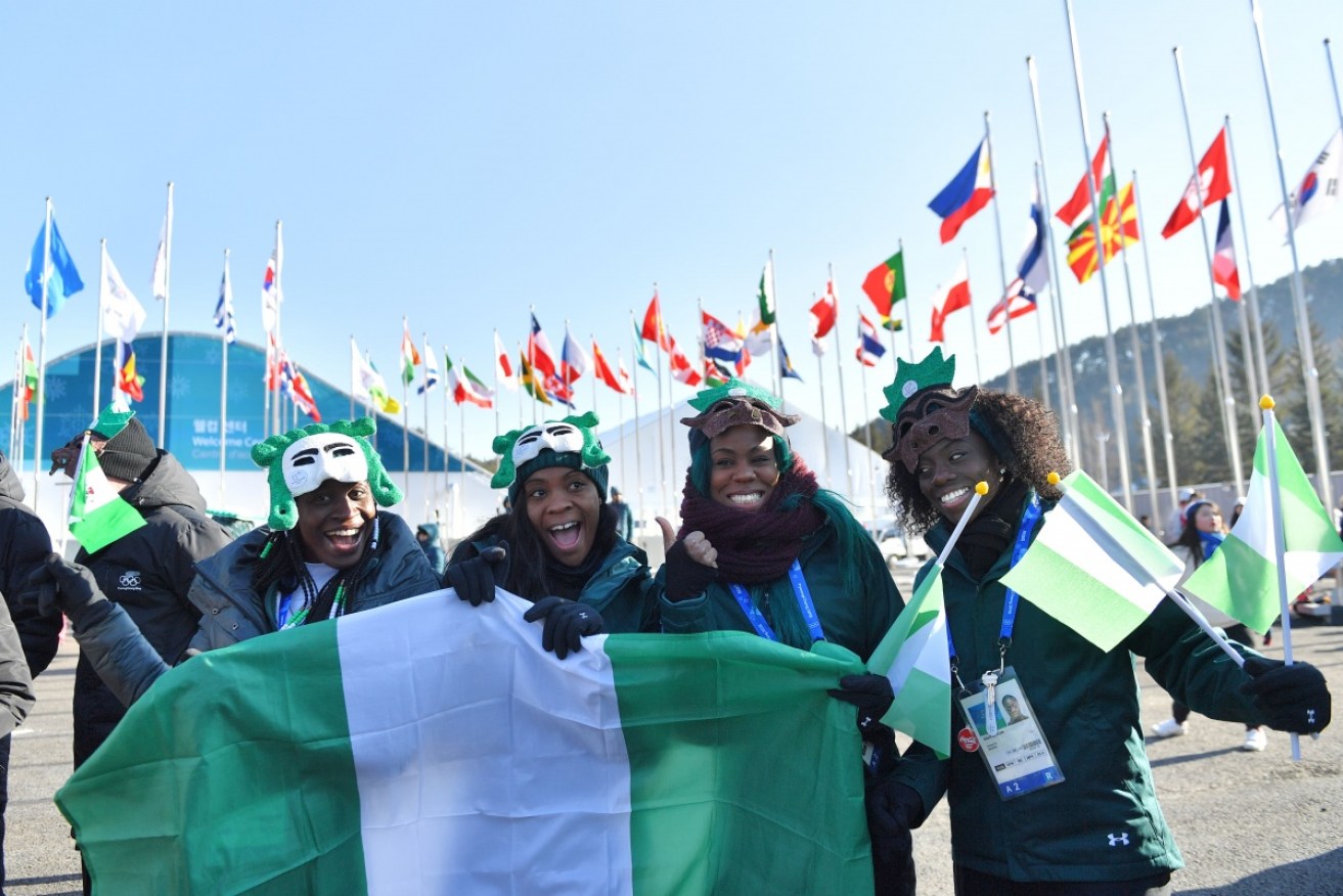 Nigeria's bobsledders –
 Seun Adigun, Ngozi Onwumere, Akuoma Omeoga – with women's skeleton entrant Simidele Adeagbo in the Olympic Village.
