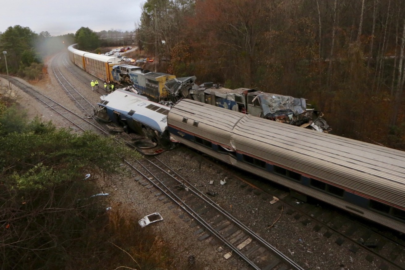 Authorities are investigating the scene of the fatal Amtrak train crash.
